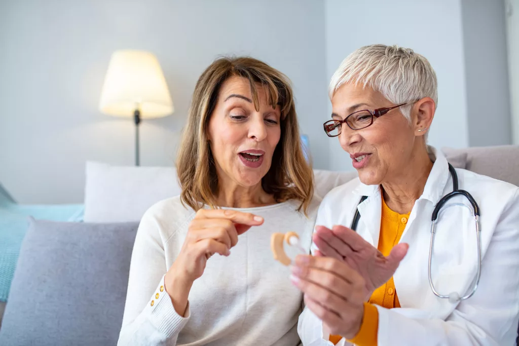 woman and doctor during hearing services consult